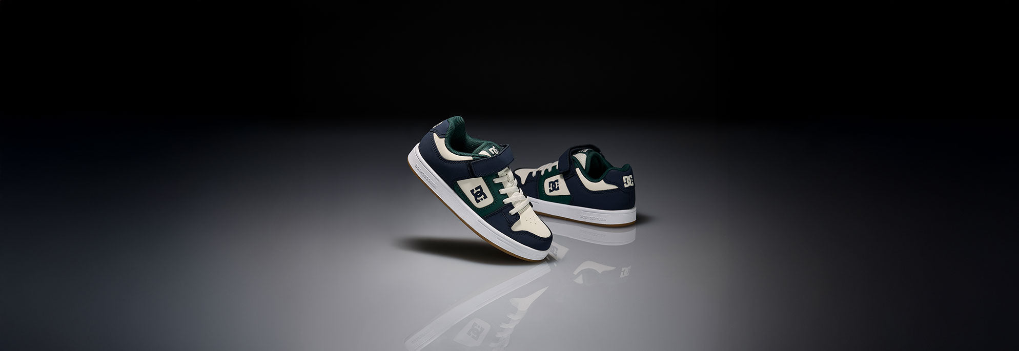 A pair of shoes with a dark background