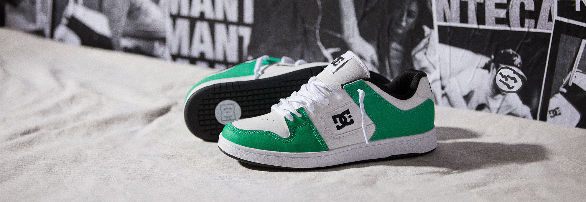 A pair of man's shoes in green and white
