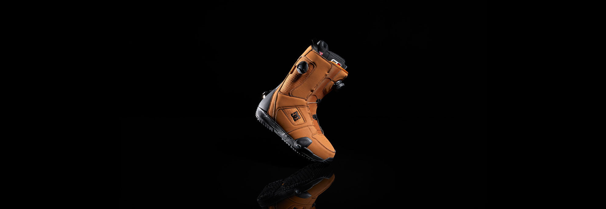 A pair of Step On Snowboard boots in a brown color