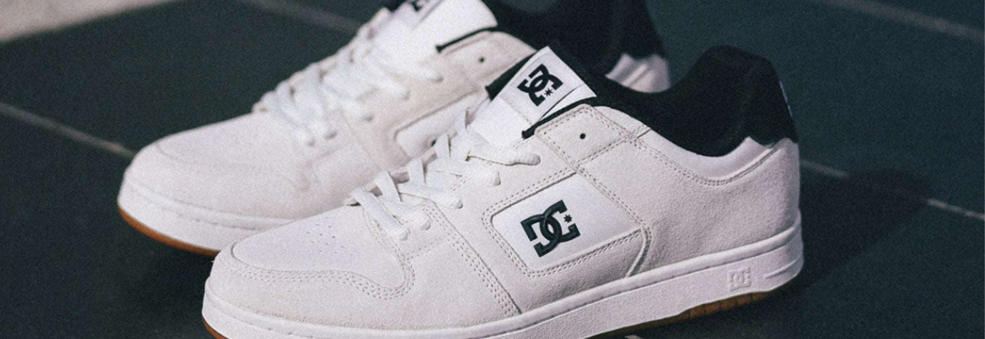 A pair of women's white shoes