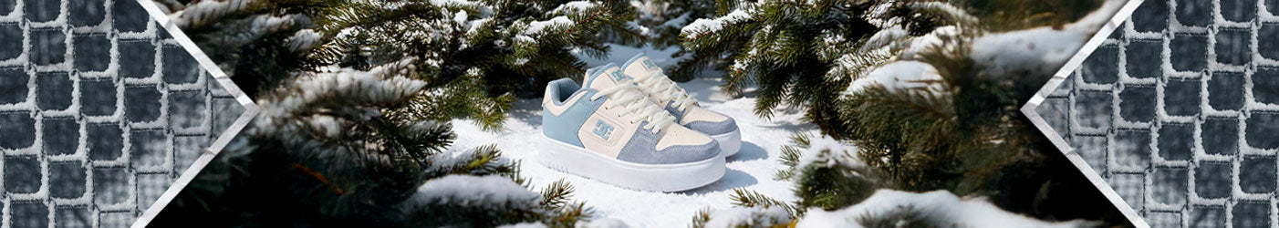 A shoe with a snowy wintery backdrop