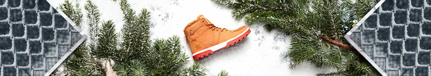 A fence with snow on it to symbolize a wintery theme