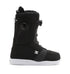 Black DC Shoes Women’s Lotus BOA® Snowboard Boots with a white Unilite outsole, featuring a round BOA® Fit System dial closure and DC Shoes logo. Includes a rear top bootstrap and reinforced heel and toe areas for added durability. Shown in side profile view.
