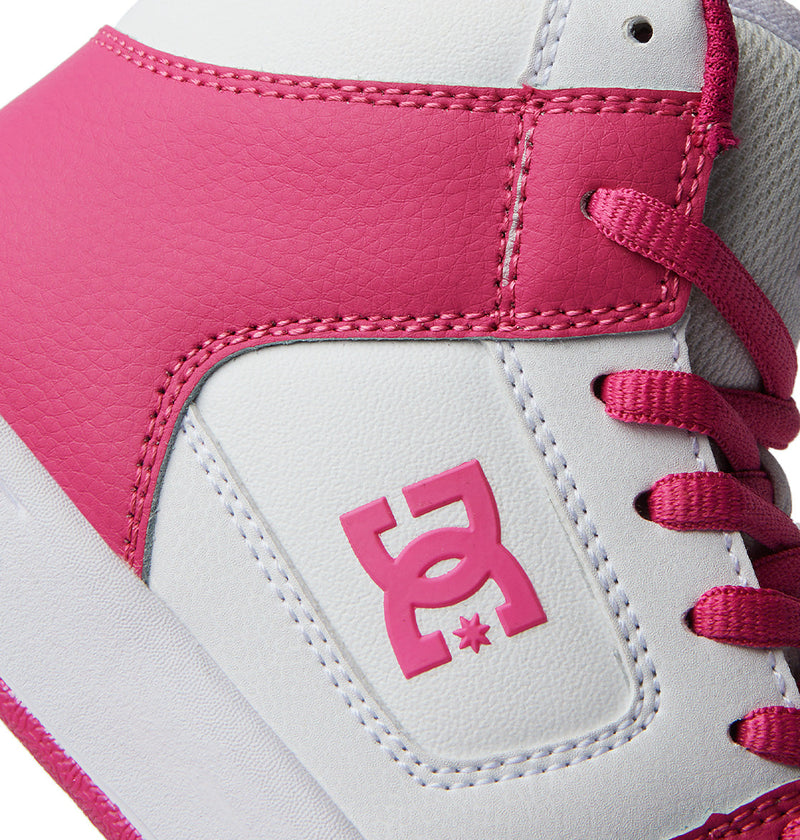 Close-up of Kids' Manteca 4 HI Shoes by DC Shoes, a white and pink high-top sneaker featuring pink laces, stitching, vibrant pink accents on the upper and sole, and an embossed DC logo on the side.