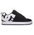 The Men’s Court Graffik Shoes by DC Shoes feature a black and white color scheme with a prominent white DC logo on the side, black laces, and a contrasting white sole. This low-top skate shoe displays the classic puffy silhouette and distinctive branding near the heel and toe.