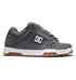 Introducing the Men’s Stag Shoes by DC Shoes: these sneakers feature a sleek gray upper with a white sole and brown tread, highlighted by the signature DC logo in white on the side. The design includes gray laces, black trim accents, and a durable cupsole crafted for long-lasting wear.