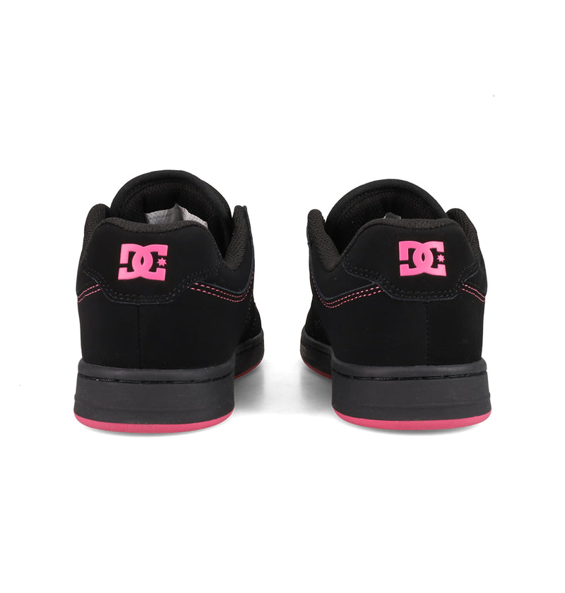 The Women's Manteca 4 Shoes by DC Shoes are black skate sneakers with pink logos on the heels, plus pink midsole and stitching details—ideal for adding a bold touch to your style.