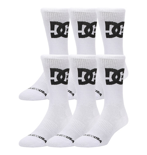 Two rows of DC Shoes Big Star Logo Crew Socks, each row with three pairs. The white crew socks feature a large black DC logo on the sides and DC SHOES USA text on the toes. Each pack contains 3 pairs.