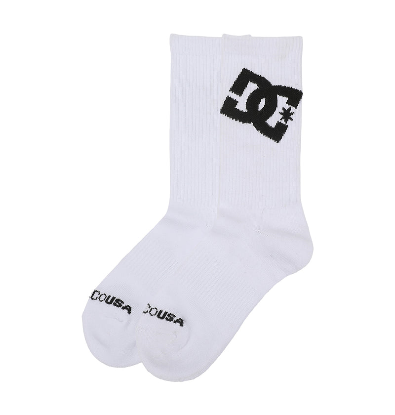The DC Shoes Graffik Logo Crew Socks 3-Pack includes white crew socks with a bold black DC Shoes logo near the top and "DC USA" in black on the toes.
