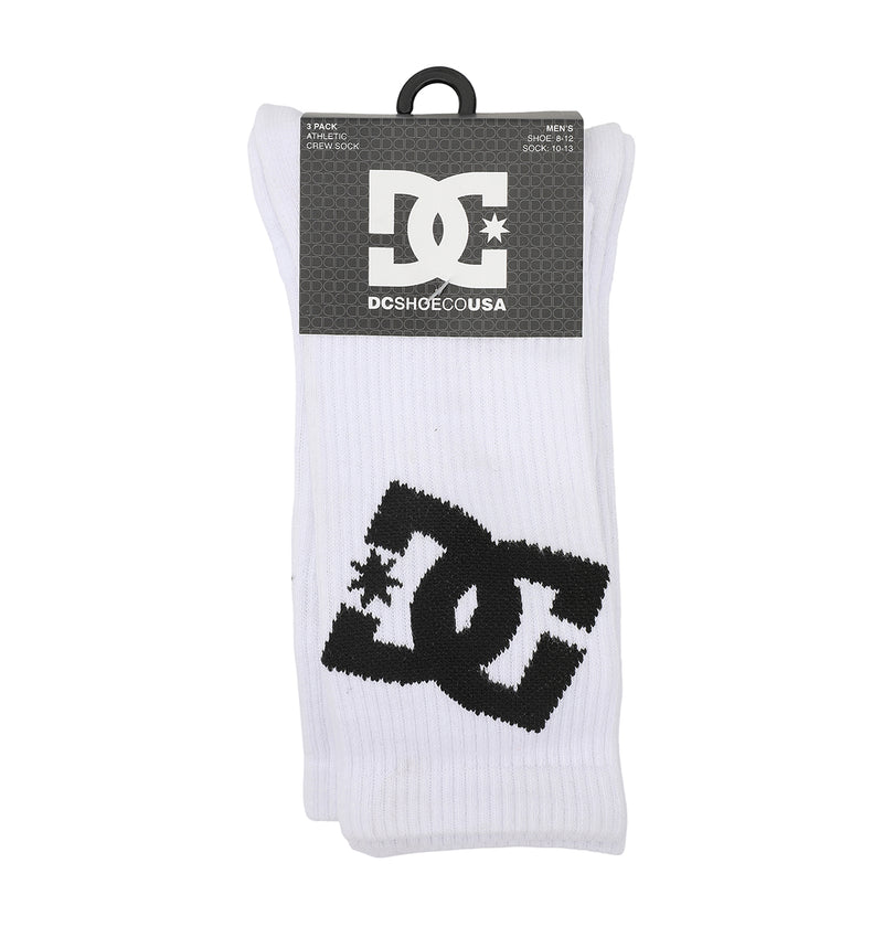 A 3-pack of DC Shoes Graffik Logo crew socks in white, each featuring a bold black DC logo on the side and packaged with a branded label at the top.