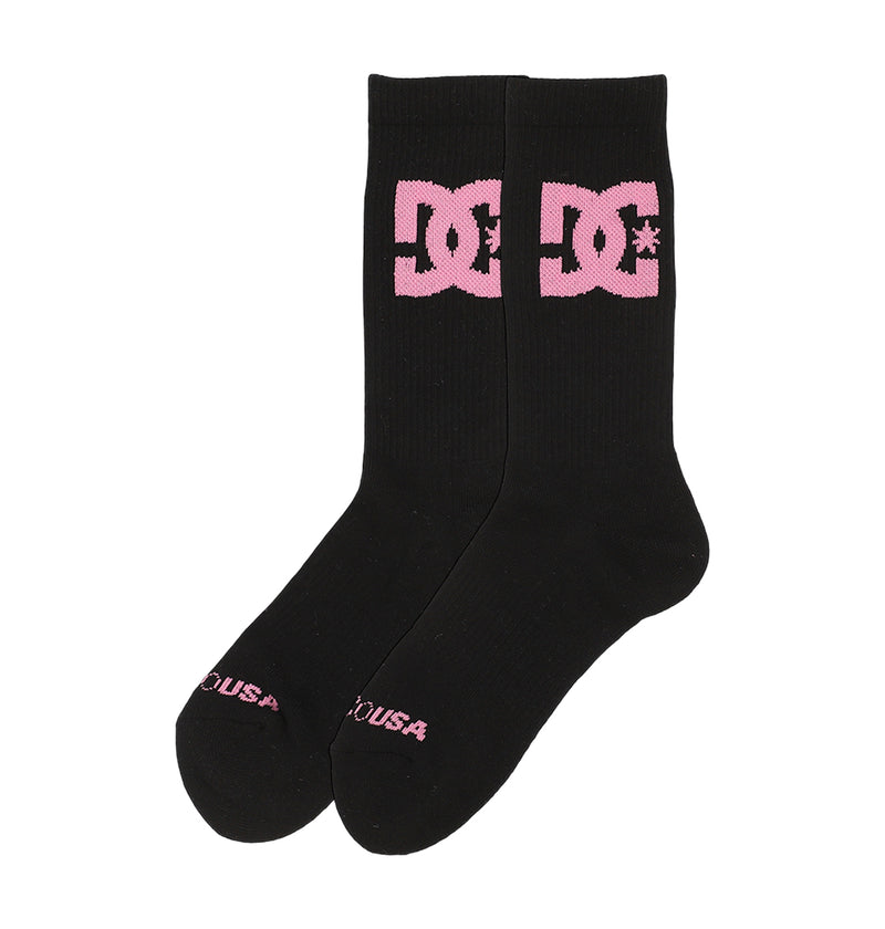 The DC Shoes Big Star Logo Crew Socks 3-Pack features black crew socks with a bold pink DC logo on the cuffs and "USA" in pink by the toes.