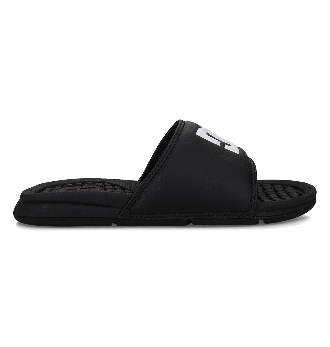 The Kids' Bolsa Slides by DC Shoes feature a black design with a thick strap showcasing white lettering, plus a textured, cushioned footbed for all-day comfort—stylish and easy slides perfect for kids.