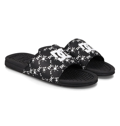 The Men's Bolsa Slides by DC Shoes feature black straps with white logos and decorative patterns, plus textured footbeds and open toes—ideal for your next skate session.