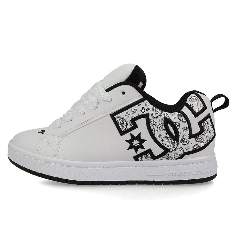 The Men's Court Graffik Shoes by DC Shoes feature a white puffy silhouette with black accents, a large outlined DC logo, paisley and star patterns in black and white, white laces, plus a black collar and heel tab.