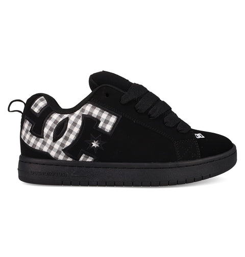 The Men's Court Graffik Shoes by DC Shoes feature a classic puffy black silhouette, thick sole, black laces, and a bold black-and-white plaid DC logo with a subtle star detail on the side.