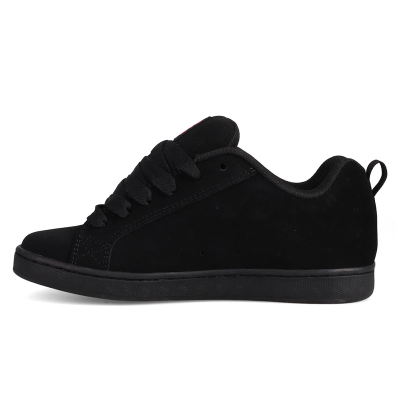 The Women's Court Graffik Shoes by DC Shoes feature a black, low-top, puffy silhouette with black laces, a black sole, suede-like finish, and the classic DC logo, shown in side profile facing left.