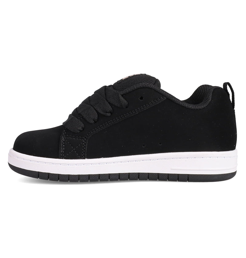 The Kids' Court Graffik Shoes by DC Shoes are black low-top sneakers with thick laces, a white rubber sole, and black tread, showcasing the classic puffy silhouette and iconic DC logo against a clean white background.