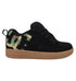 The Kids' Court Graffik Shoes by DC Shoes feature a puffy black silhouette, brown sole, and camo pattern inside the large DC logo. Details include DCSHOECOUSA text on the midsole, black laces, plus a padded tongue and collar.