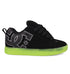 The DC Shoes Men's Court Graffik SE features a puffy black silhouette, premium uppers, oversized gray DC logo on the side, thick black laces, and a vibrant neon green semi-translucent sole.