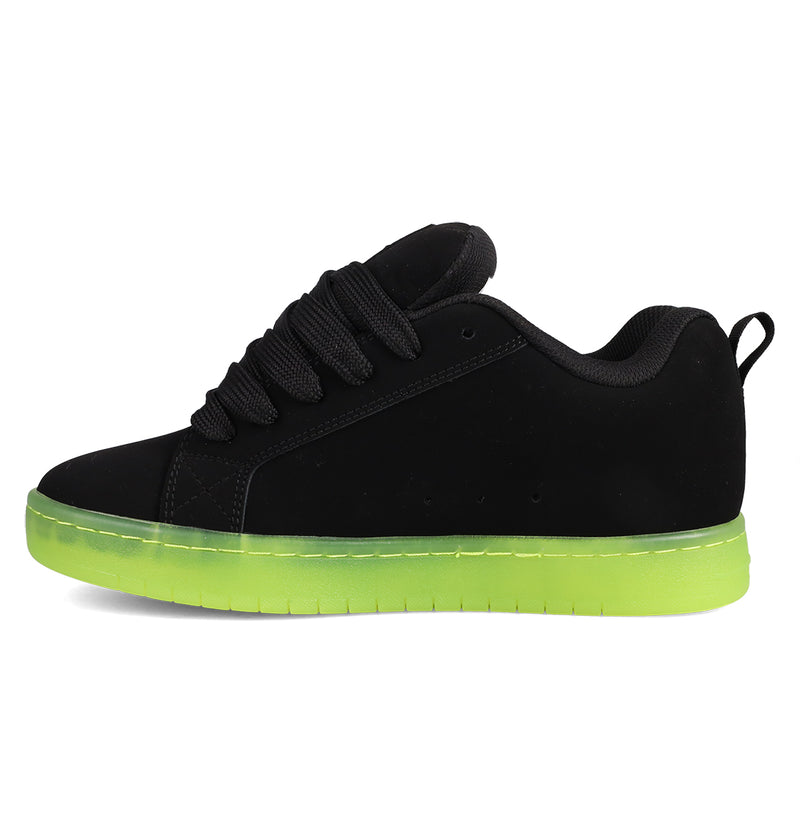 The DC Shoes Men's Court Graffik SE features a puffy black upper with premium materials, thick black laces, and a neon green sole, displayed in side profile against a white background.
