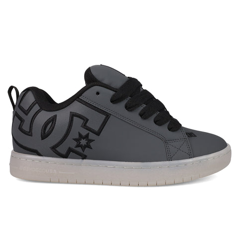 The Men's Court Graffik SE Shoes by DC Shoes feature a gray and black puffy silhouette, a large side logo, black laces, white sole, low-top design, and visible stitching for added style.