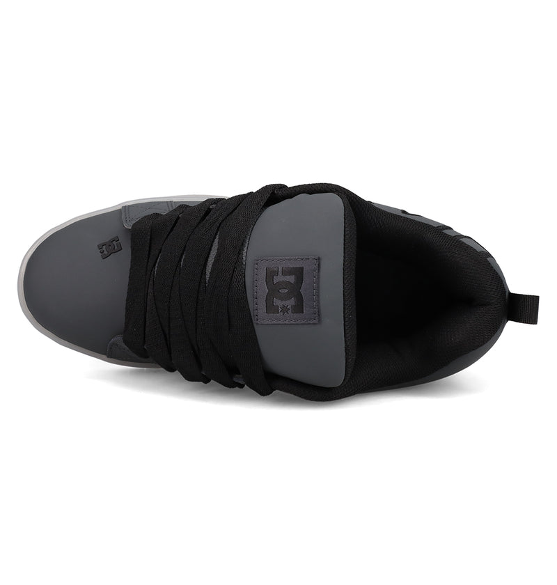 Top view of the Men's Court Graffik SE Shoes by DC Shoes in black and dark gray, featuring wide black laces, a puffy silhouette, DC logo on the tongue, padded collar, and a heel loop.