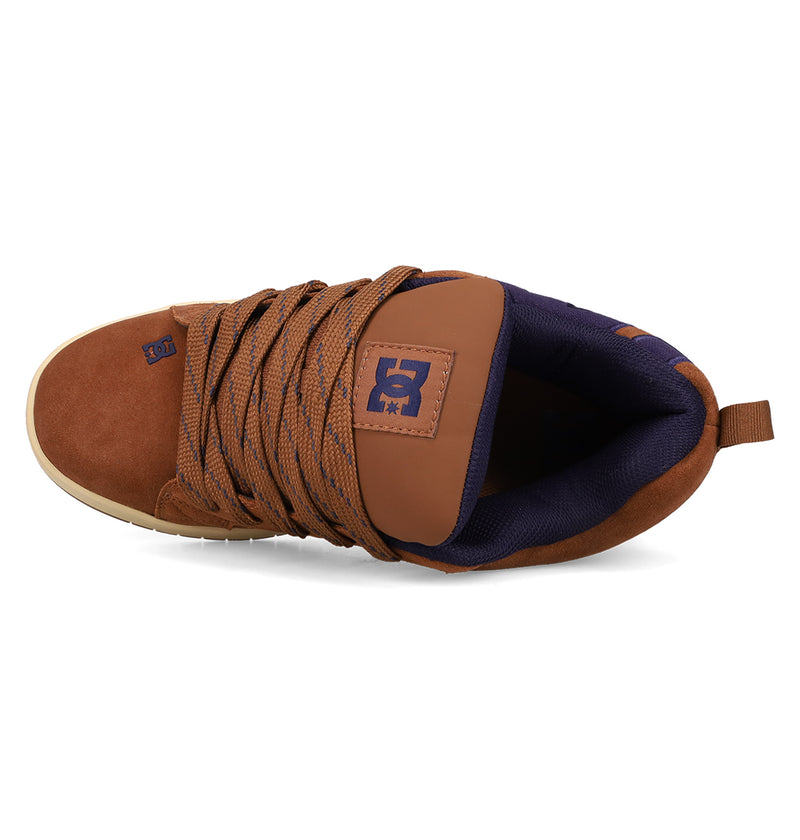 Top view of the DC Shoes Men's Court Graffik SE: a brown and navy skate shoe with a puffy silhouette, thick patterned laces, padded tongue with blue logo, premium upper materials, and a heel pull tab.