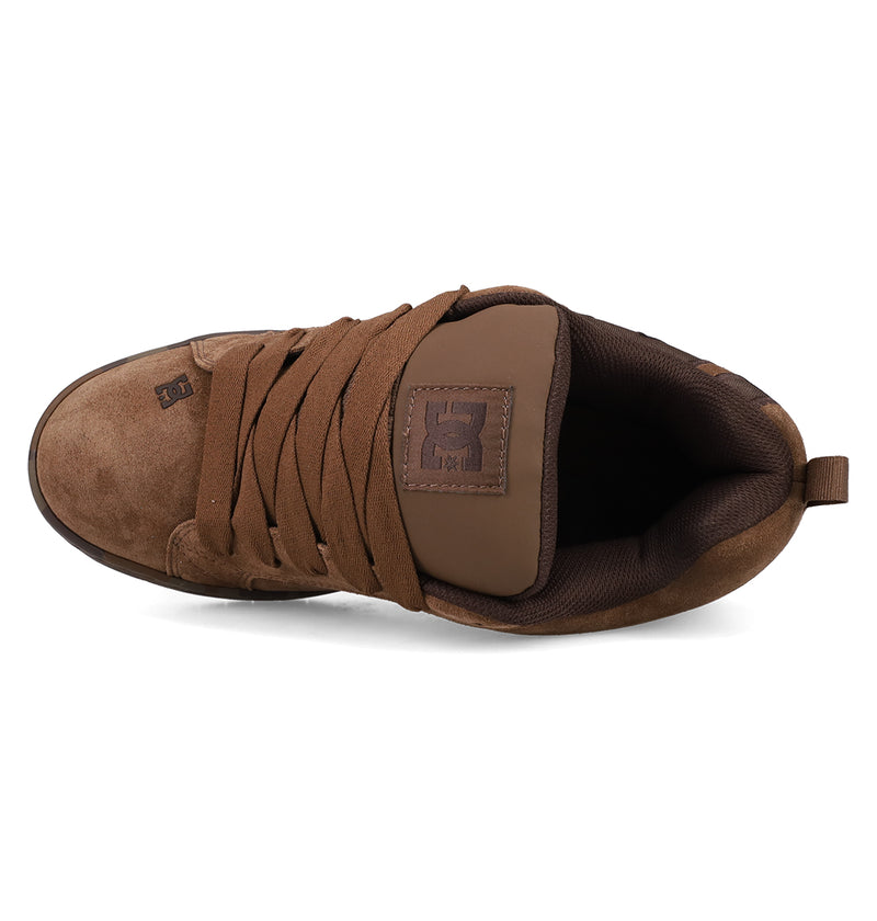 Top view of the Men's Court Graffik SE Shoes by DC Shoes in brown suede, featuring thick brown laces, a padded tongue with a dark brown logo, premium upper materials, rounded toe, puffy silhouette, and heel pull tab.