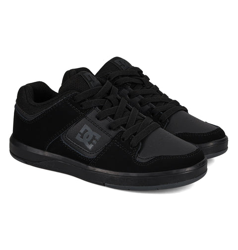The Kids' DC Shoes Cure Elastic Shoes by DC Shoes are black skate shoes with black laces, black soles, and the DC logo on the side, photographed on a white background.