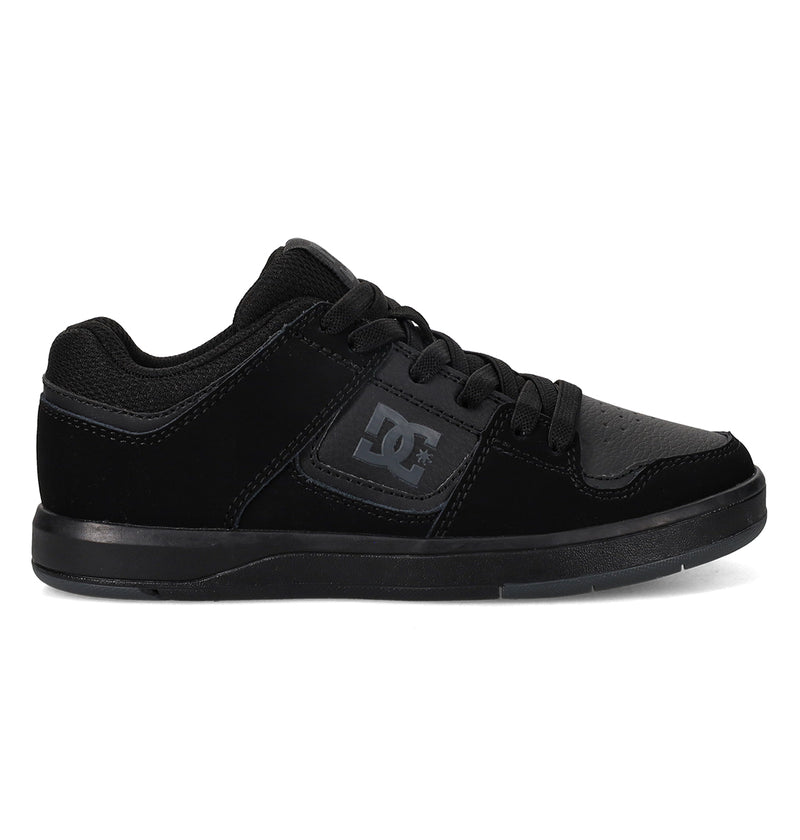 The Kids' DC Shoes Cure Elastic Shoes by DC Shoes feature a black low-top design with black laces, a DC logo on the side, a textured rubber sole, and a mix of matte and slightly glossy materials.