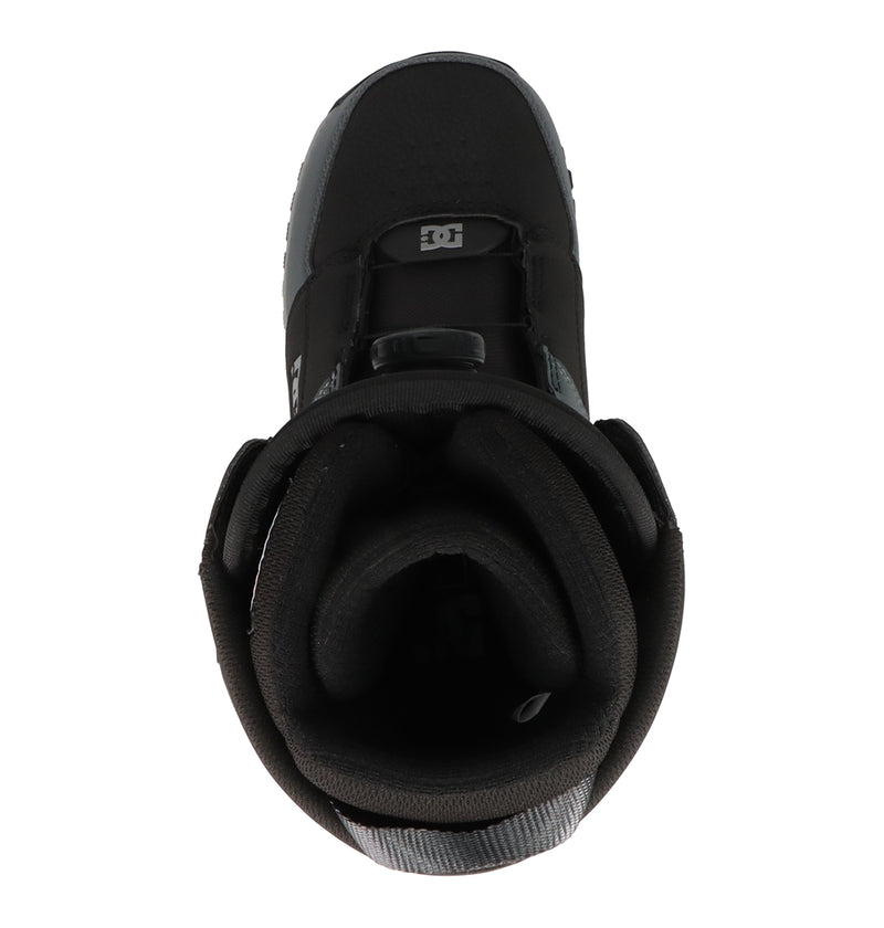 Top view of the DC Shoes Men's Control Snowboard Boots in black, featuring thick padded ankle support, gray accents, and a visible tongue with the DC logo—showcasing innovative design for ultimate comfort and performance.