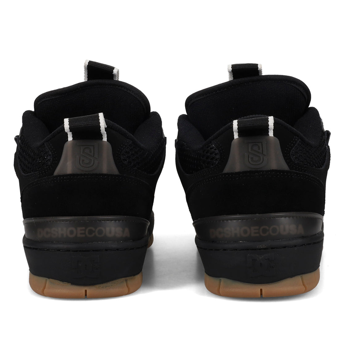 Black athletic shoes with visible brand logo on a white background