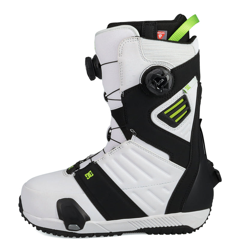 A side view of the DC Shoes Men's Judge Step On® Snowboard Boots in white, black, and green, featuring a textured sole, adjustable BOA Fit System dial, and built-in ankle support.