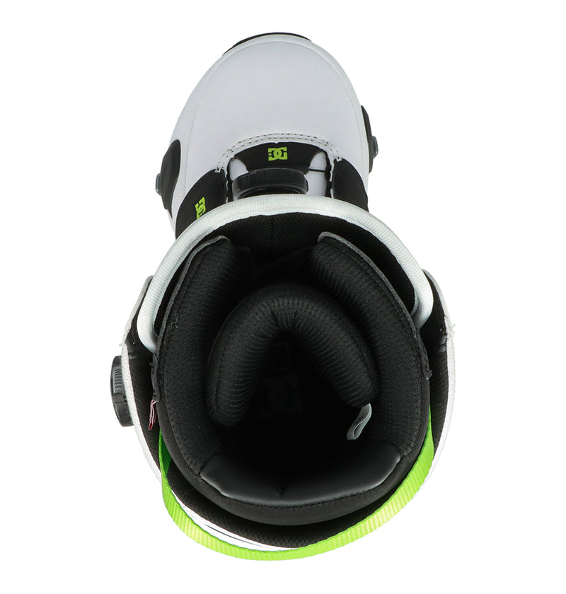Top view of the DC Shoes Men's Judge Step On® Snowboard Boot in white and black with green accents, featuring thick padding, the DC logo on the tongue, and engineered for seamless integration with Step On® bindings to enhance performance.