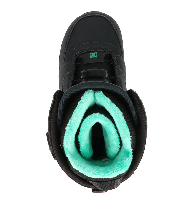 Top view of the DC Shoes Women's Lotus Dk Snowboard Boot in black, featuring a soft teal-colored inner lining and the DC logo on the tongue. The boot is open, showcasing the plush premium R2 liner designed for exceptional comfort and warmth.
