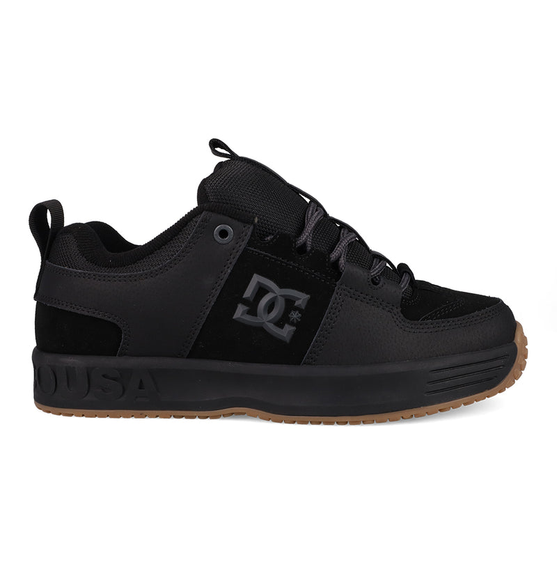 The Men's Lynx OG Shoes by DC Shoes feature a black mesh and leather upper, gum sole, DC logo on the side, black laces, heel pull tab, and are inspired by the Lynx—perfect for skateboarding.