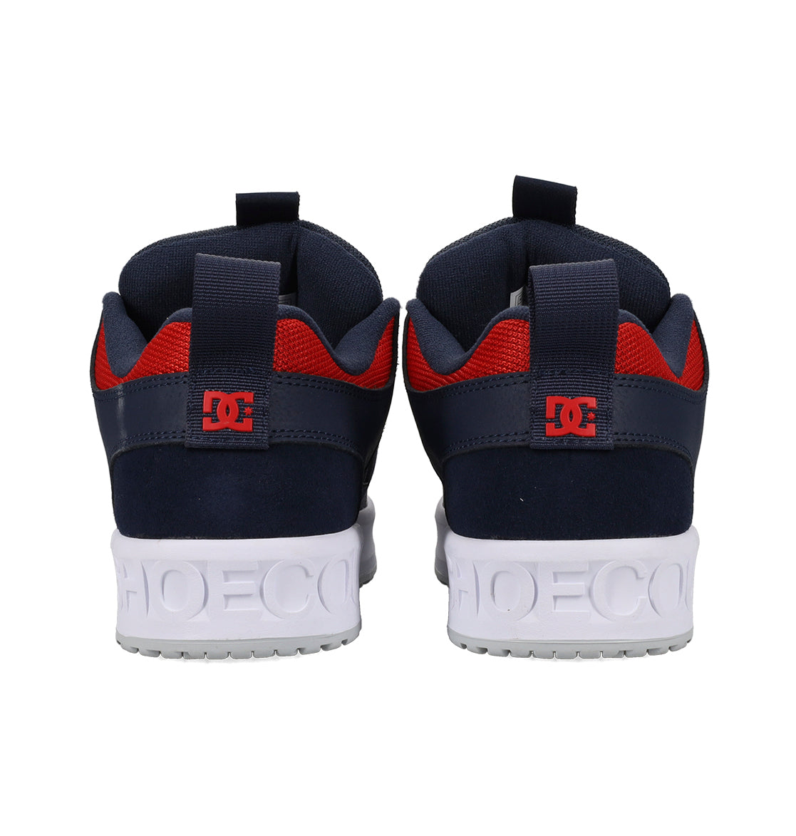 Navy and red sneakers with white soles on a white background