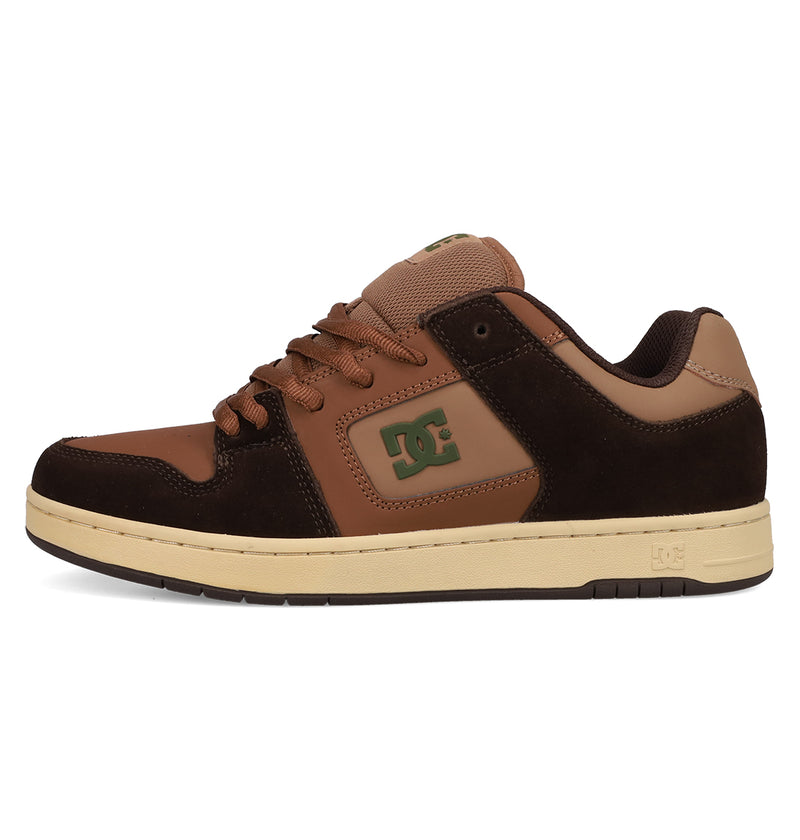 A brown and tan Men's Manteca 4 sneaker by DC Shoes, featuring a green DC logo on the side, brown laces, beige sole, and black accents. Shown from a side view against a white background.