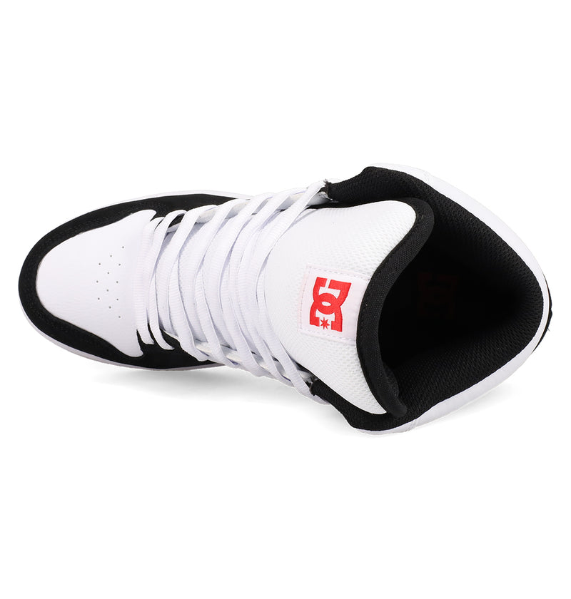 The Men's Manteca 4 Hi Shoes by DC Shoes are high-top basketball sneakers in black and white, shown from above, with vintage style, white laces, a padded black collar, and a red DC logo on the tongue.