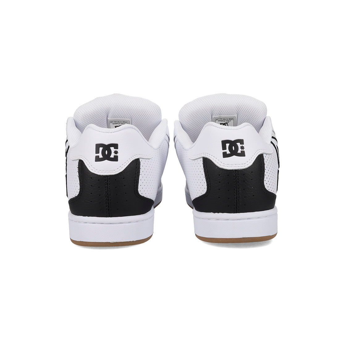Rear view of the Men's Net Shoes by DC Shoes in black and white, featuring the DC logo on the heel and a signature puffy design for all-day comfort, set against a white background.