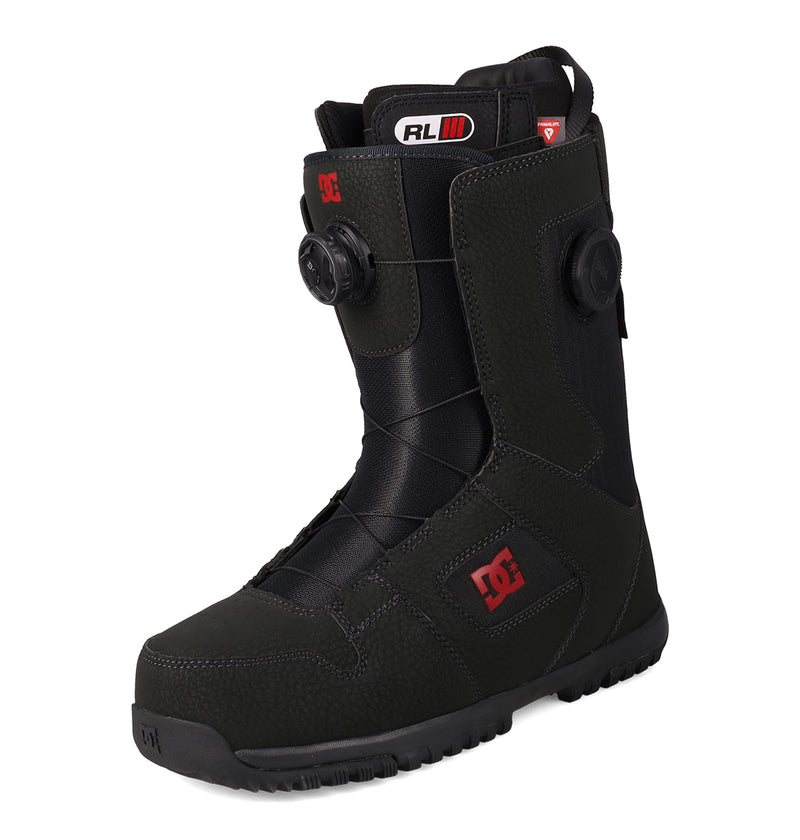 The DC Shoes Men's Phase BOA® Pro Snowboard Boots in black, featuring red DC logos and dual BOA Fit System dials, are displayed at an angle against a white background.