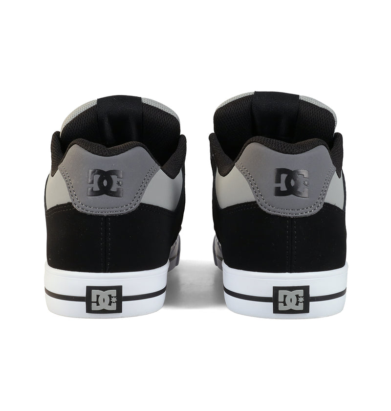 A pair of DC Shoes Men's Pure Shoes in black and gray, shown from the back with the DC logo on the heel, white rubber soles, and a black stripe—versatile footwear perfect for everyday comfort and signature skate style.