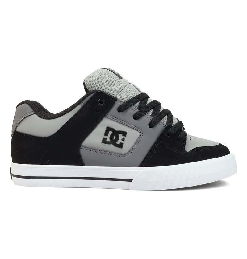 The Men's Pure Shoes by DC Shoes feature a grey and black design with a white sole, black laces, and the DC logo on the side—versatile men's sneakers shown from the left profile against a white background.