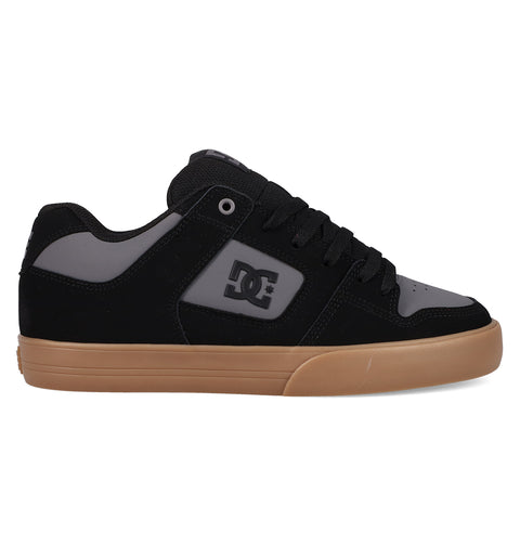 The DC Shoes Men's Pure Shoes are black and gray low-top skate shoes with a gum sole, black laces, and the DC logo on the side—ideal for skating sessions or casual wear.