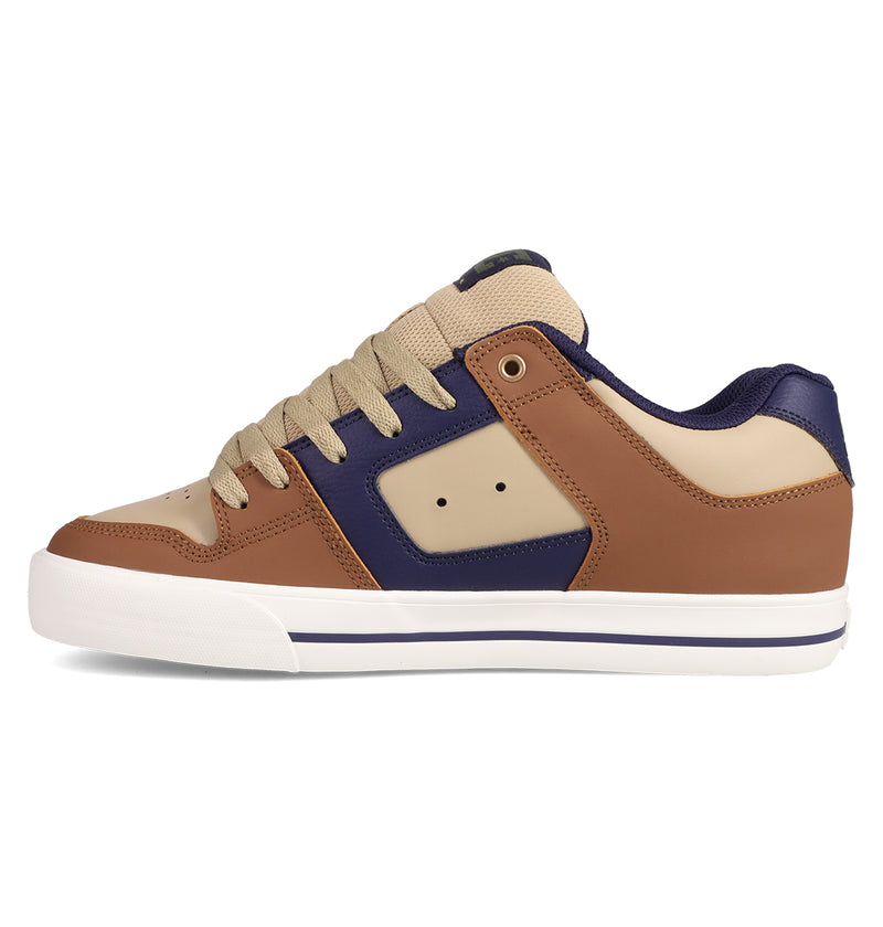 The DC Shoes Men's Pure Shoes are low-top men's sneakers with beige, brown, and dark blue panels, beige laces, and a white sole with a dark blue stripe—versatile and comfortable, shown in a left side profile view.