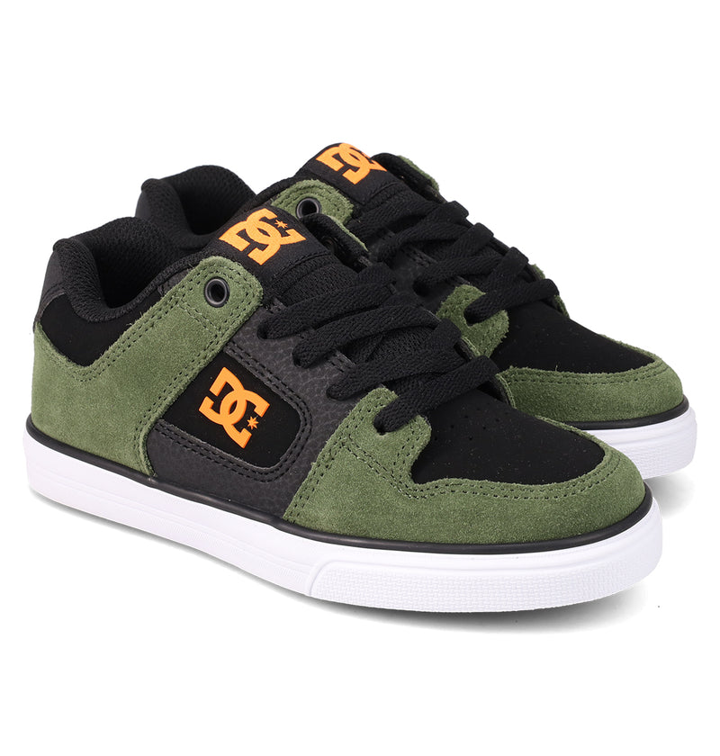 The DC Shoes Kids' Pure Shoes feature black mesh and green suede uppers, orange DC logos, black laces, and white rubber soles—stylish and comfortable footwear designed for versatile everyday wear.