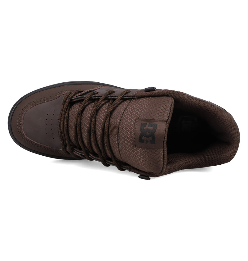 Top view of a brown DC Shoes Men's Pure Shoe with laces, textured upper, and DC logo on the tongue—ideal for those after comfort and versatile style.
