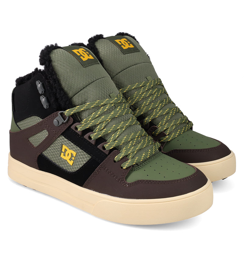 The DC Shoes Men's Pure High Top WC Shoes feature a vintage-inspired skate style in olive green, brown, and black with yellow accents, textured laces, fuzzy-lined padded collars, and beige rubber soles.