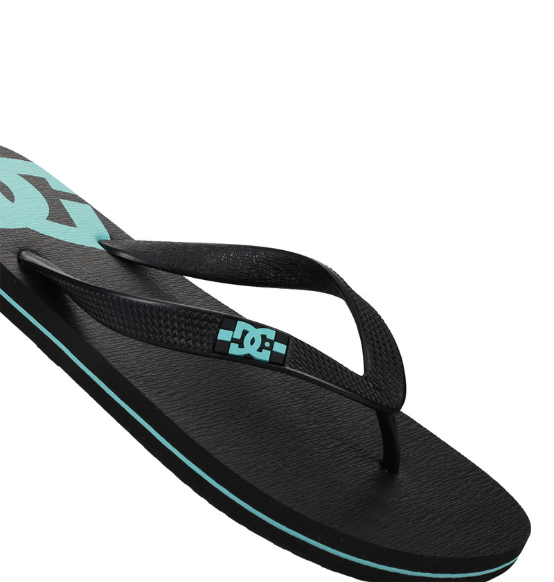 The DC Shoes Men's Spray Slides feature black slip-on design, textured black straps with a small blue DC logo, a light blue logo on the footbed, and a matching blue accent along the sole—ideal for post-skate comfort.