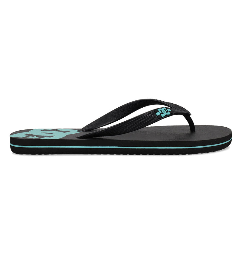 The DC Shoes Men's Spray Slides are black slip-on sandals with turquoise accents, including a turquoise logo on the footbed and strap. Featuring a textured sole, they're perfect for casual wear or after skating.